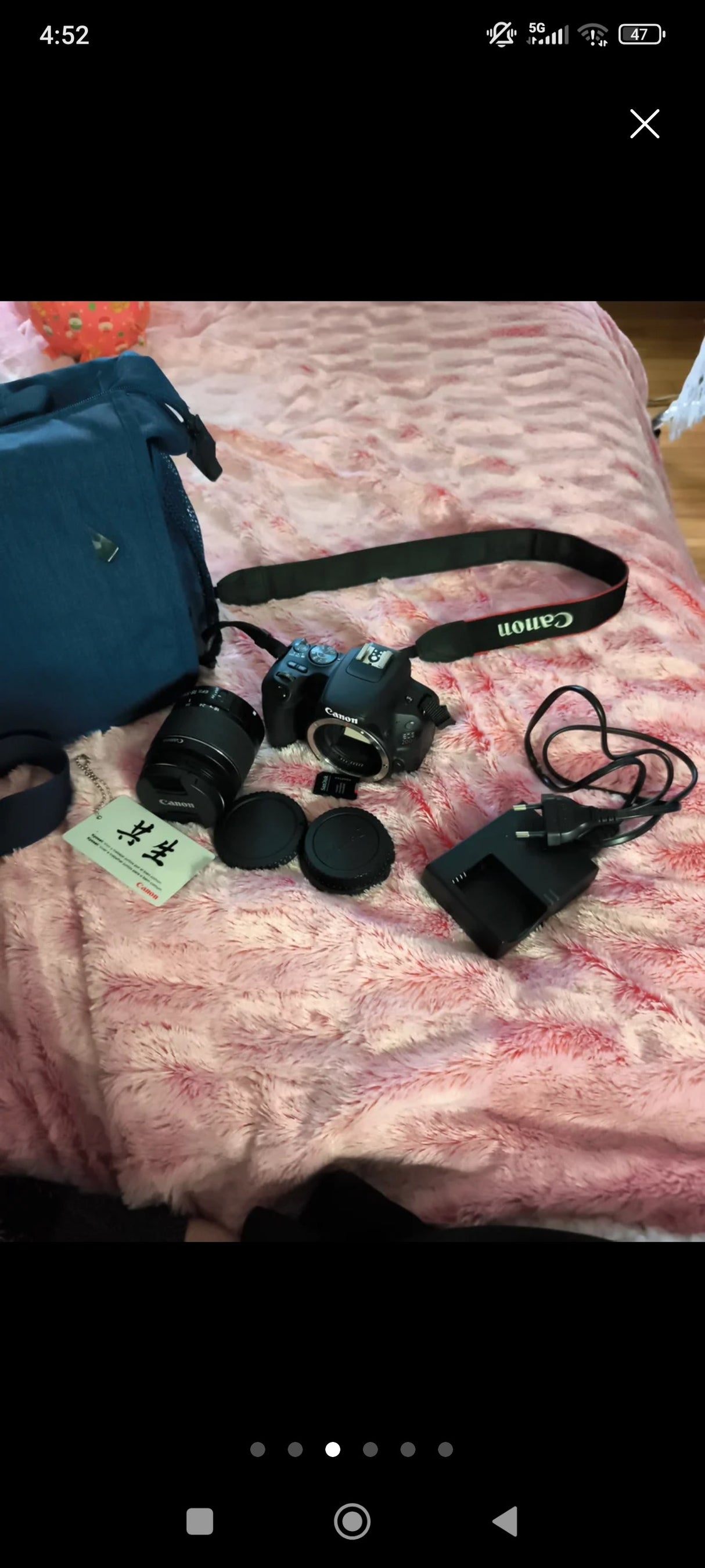 Canon EOS 200D265a7488-ef24-441e-b817-9eaf36788eef