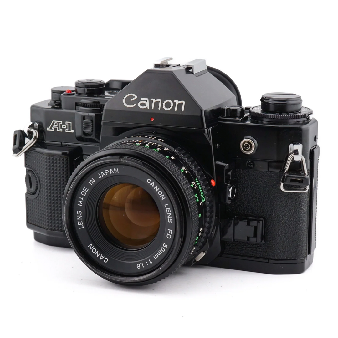 Fotocamera reflex Canon A-1 + 50mm FD 1.8 - 35mm · immagine principale