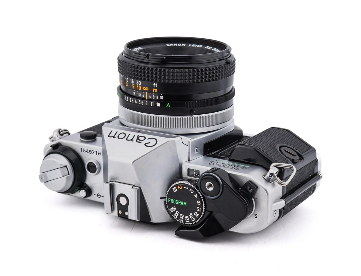 Programma Canon AE-1 + 50mm f1.8 S.C. - Fotocamera reflex 35mm