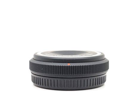 Olympus 9mm f/8 Fisheye Body Cap - segunda mano - excelente estado - foto principal - SKU 3781384 - Camera Market