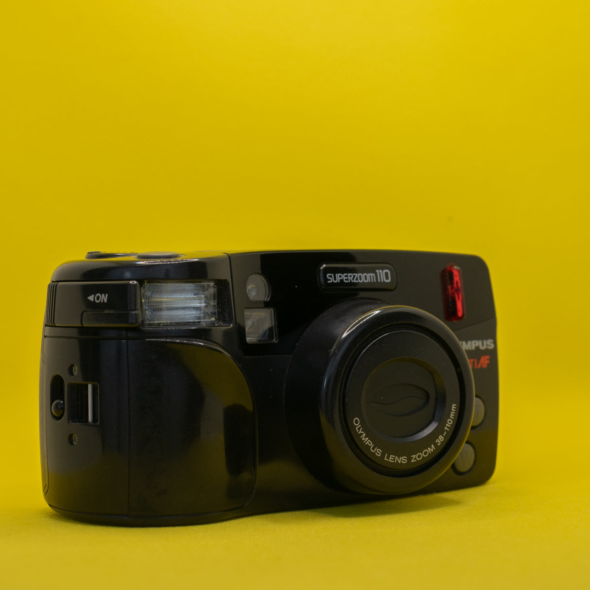 Fotocamera a pellicola Olympus Superzoom 110 - 35 mm